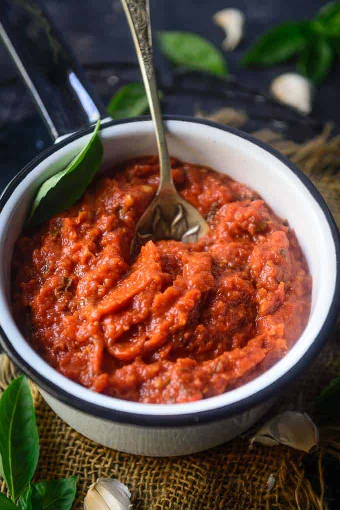 Pizza sauce in a pan.