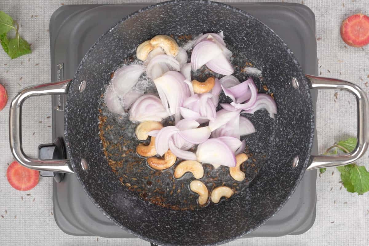 Onions added to the pan.