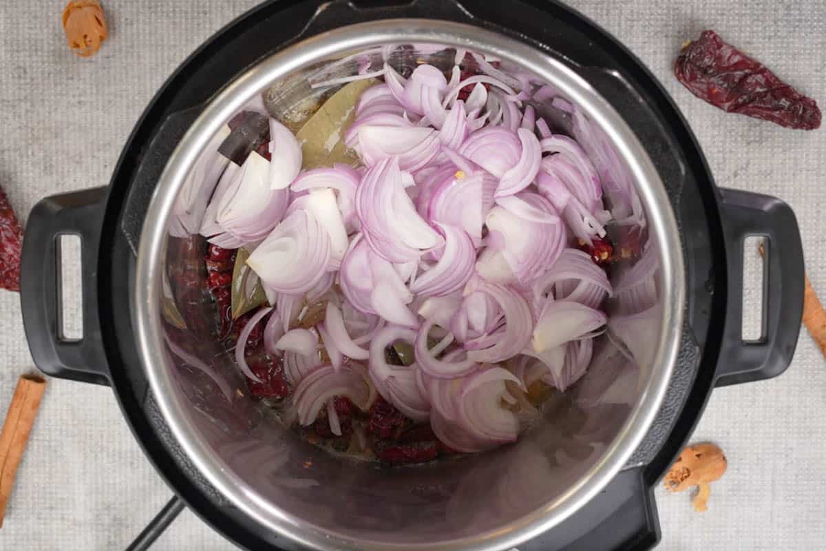 Onions added to the pot.