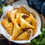 Chicken Samosa is a deep-fried snack where a crispy patty is filled with the flavourful chicken masala. Here is how to make it.
