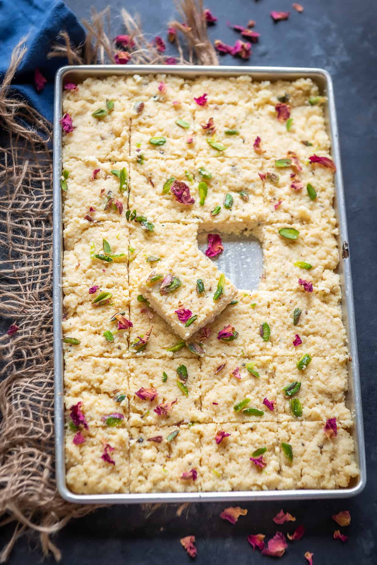 Kalakand served in the tray.