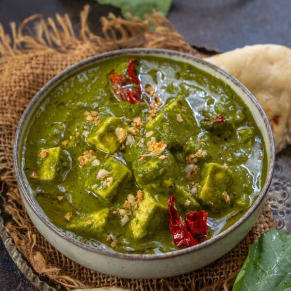 Made using paneer (Indian cottage cheese) and spinach puree, this Palak Paneer Curry is a delight to eat with any Indian bread. Follow my simple recipe to make it at home.
