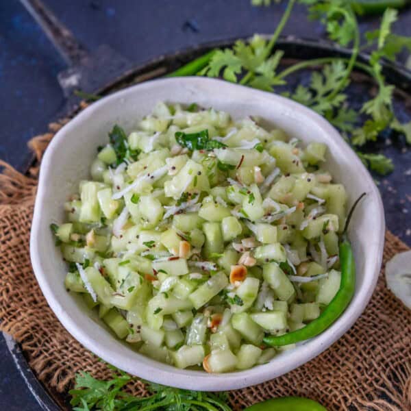Kakdi Koshimbir (Khamang Kakdi) is a simple Maharashtrian salad prepared from cucumber, yogurt, peanuts, coconut, and a few other simple ingredients. Here is how to make it.