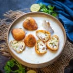 This Restaurant Style Malai Kofta in white gravy is rich and creamy curry that is easy to make at home. Here is how to make it.