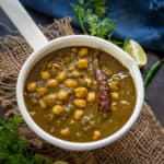 Palak Chole or Chana Palak is a delicious way to incorporate greens in your meal. This dish has the goodness of spinach, chick peas, tomato puree - indeed one of the best palak recipes, it is! Here is how to make it.