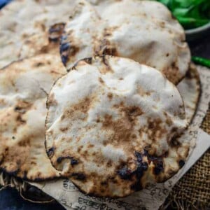 Khamiri Roti, a traditional Indian bread that was a staple in the Mughal era. It is made with whole wheat flour, yeast and milk and is extremely soft and spongy. Do try this one for your festive meals. Here is how to make Khamiri Roti Recipe.