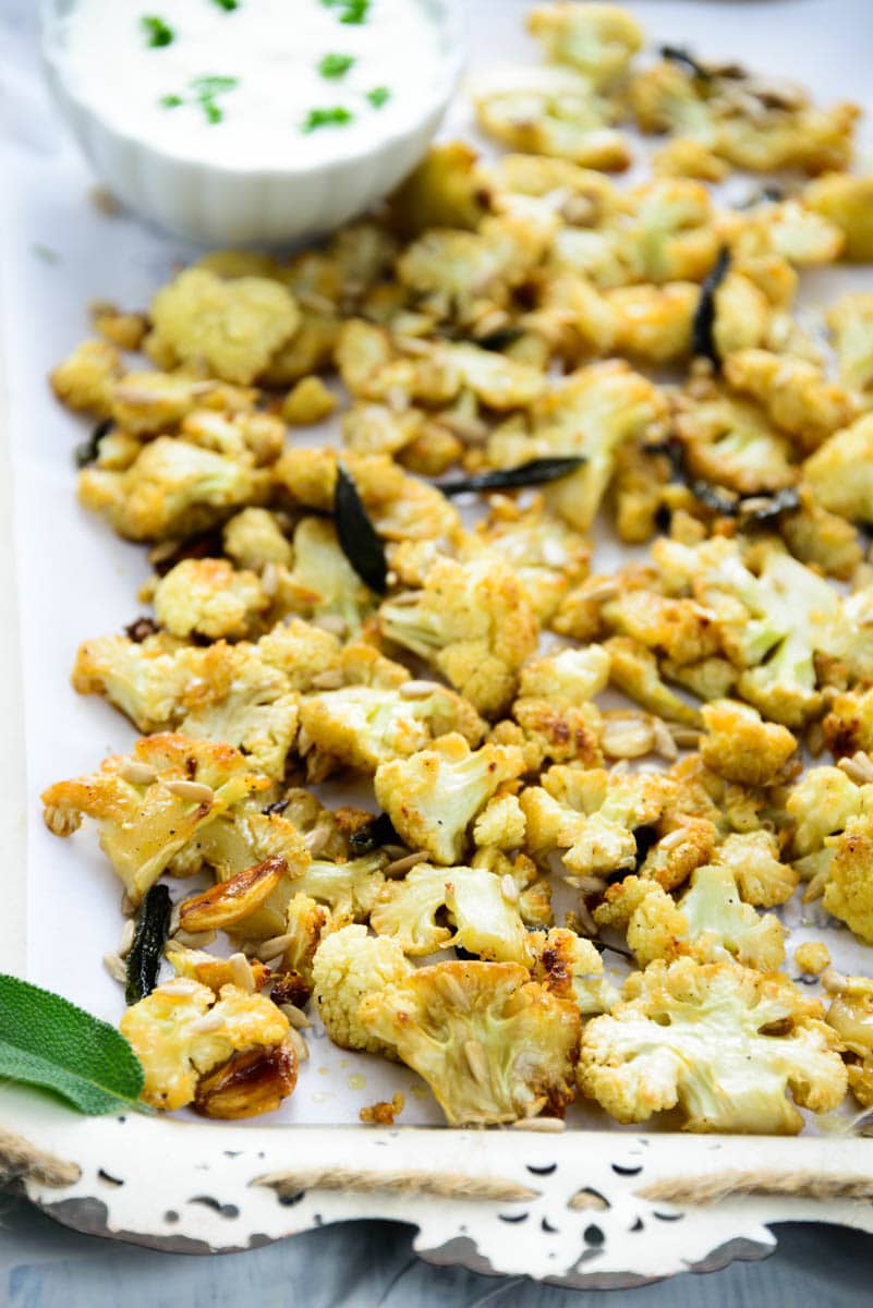 Honey roasted cauliflower with sage and sunflower seeds is a healthy and delicious option for snacks. Here is a tried and tested recipe to make it.