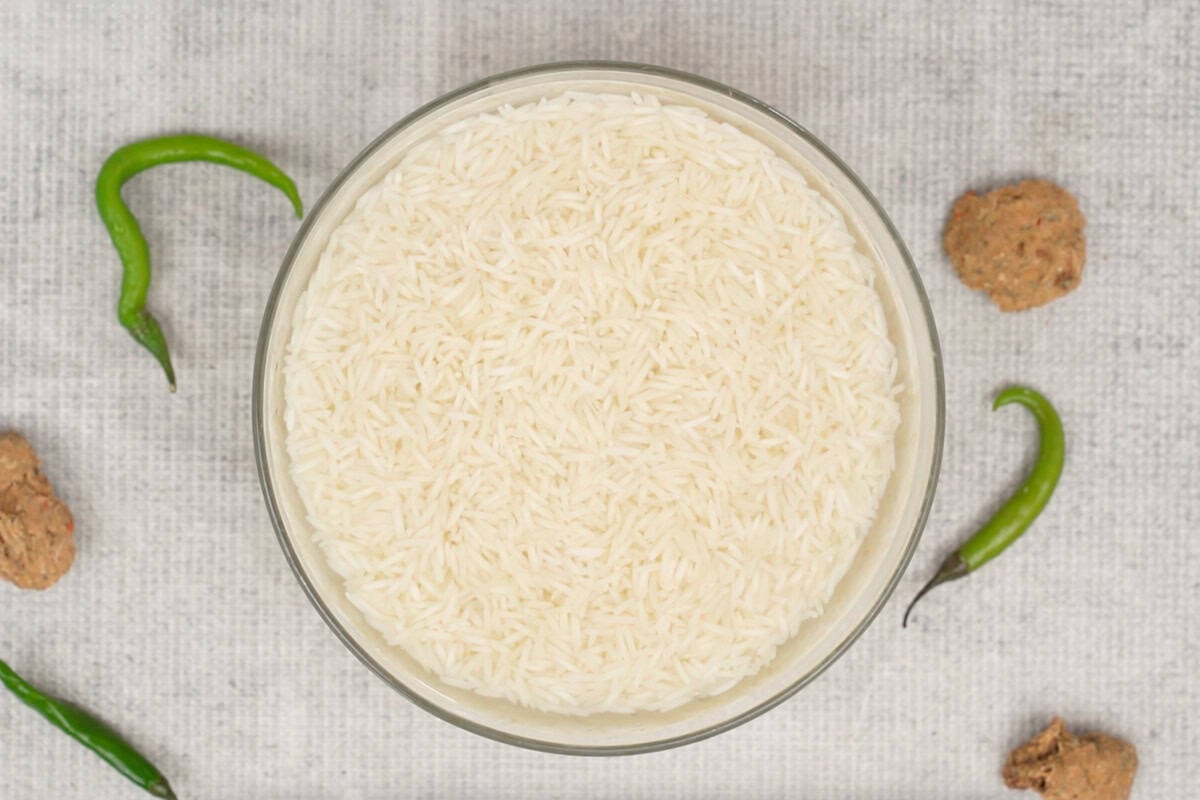 Rice soaked in water.