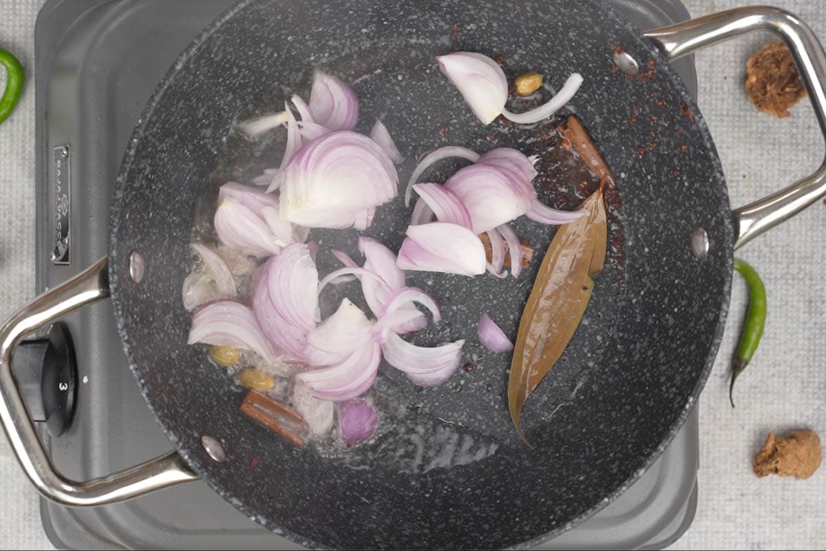 Onions added to the pan.