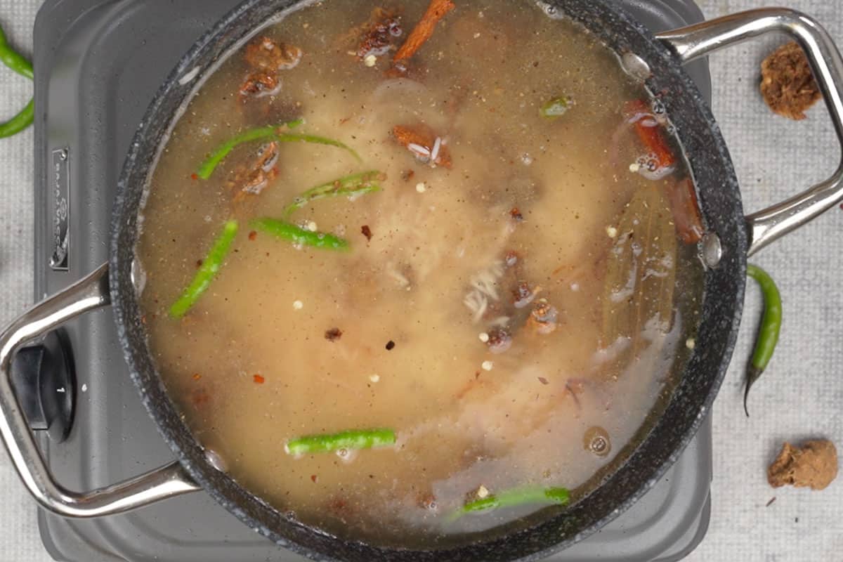 Remaining ingredients and water added to the pan.