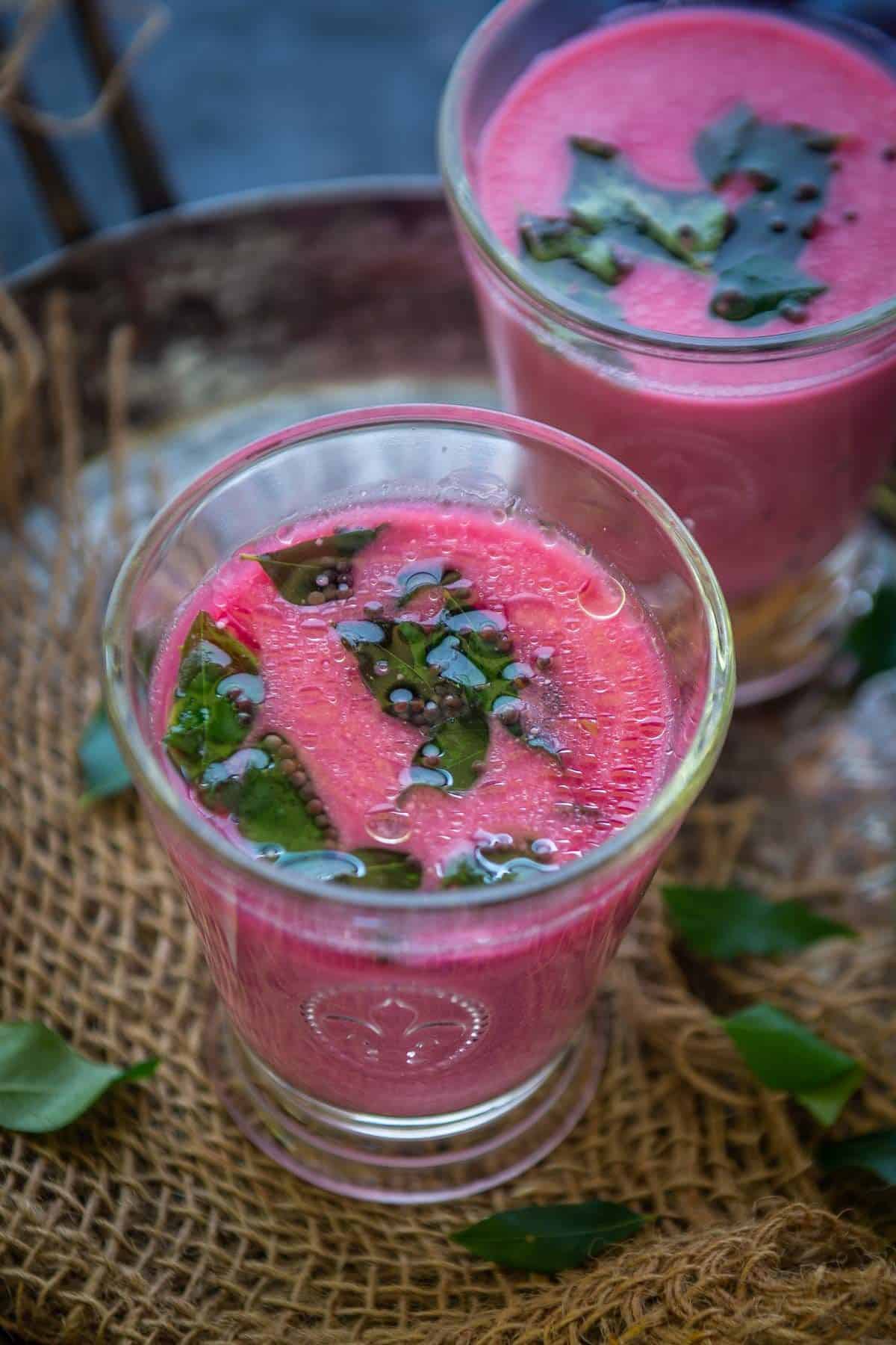 Beetroot chaas served in a glass.