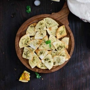 Za'atar Pita Chips is a quick and easy to make snack which can be made in just no time. Here is how to make Za'atar Spiced Pita Chips.