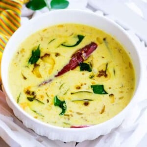 Moru Curry is Kerala style seasoned buttermilk which is served as a part of Onam sadya. It is very quick and easy to make.