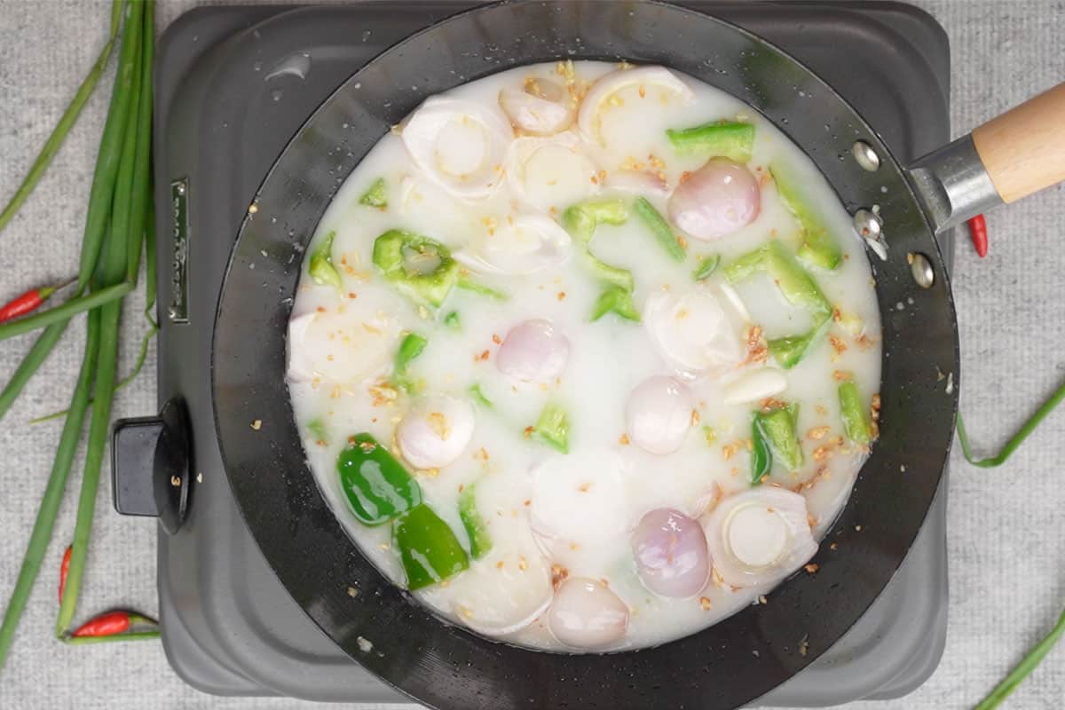 Cornstarch slurry added to the wok.