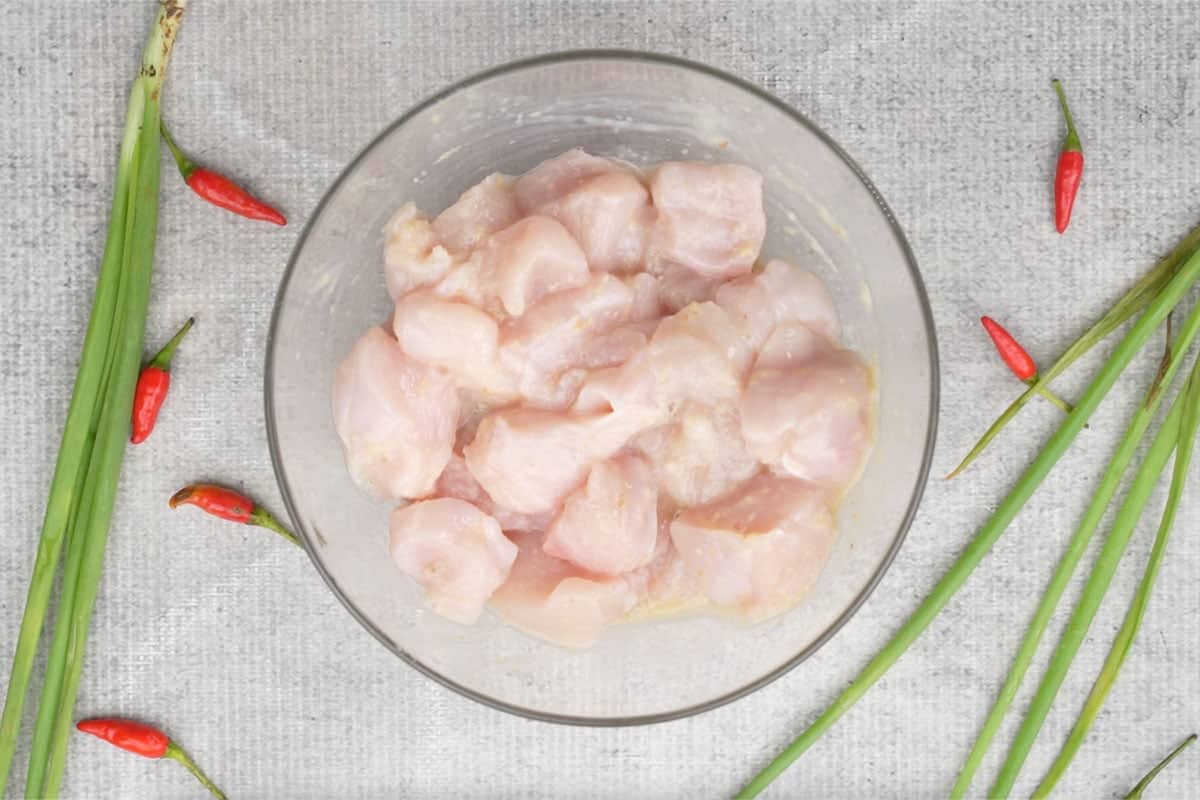 Chicken mixed with the marinade.