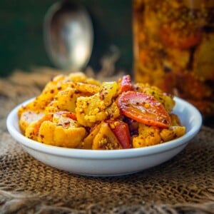 Gajar Gobhi Shalgam Achar is a delicious Indian pickle made using fresh carrots, cauliflower, and turnips. This special winter pickle can be stored for 3-4 months. Here is how to make it (vegan).