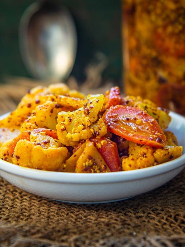 Gajar Gobhi Shalgam Achar is a delicious Indian pickle made using fresh carrots, cauliflower, and turnips. This special winter pickle can be stored for 3-4 months. Here is how to make it (vegan).