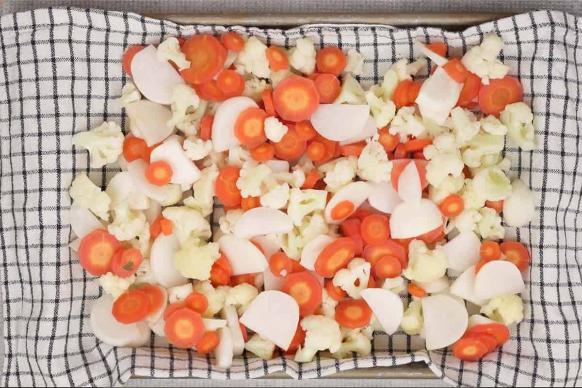 Vegetables spread on a cloth.