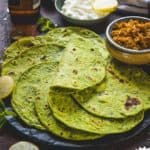 Spinach Tortilla is a delicious and healthy twist on the regular Tortilla recipe. It's super easy to make at home and I have a trick to make those round tortillas with zero effort. Check out the recipe.