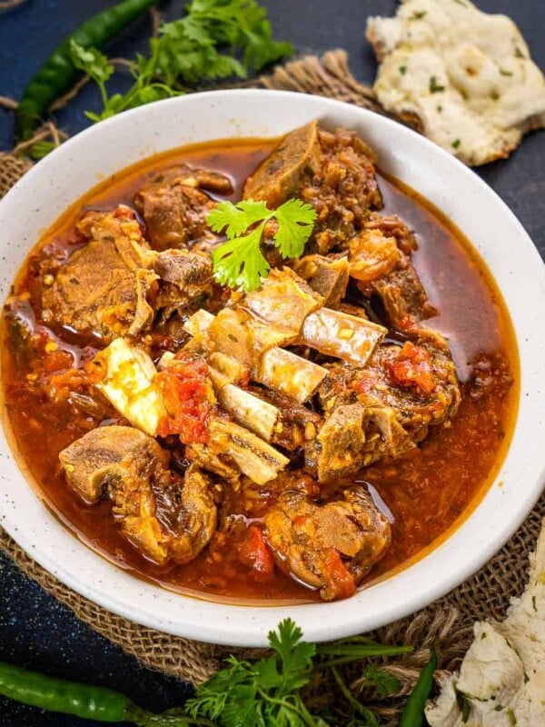 Peshawari Kadhai Gosht is a flavorful mutton curry made in the Peshawar region which is now a part of Pakistan. This mutton curry is made using very few ingredients in a kadai (heavy bottom pan). Here is how to make it.