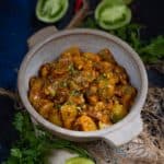 Green Tomato Curry (Hare Tamatar Ki Sabji, Raw Tomato Curry) is a sweet, tangy, and spicy sabji made using unripe green tomatoes, jaggery, and a few simple Indian spices. Serve it with roti or paratha for a hearty meal.