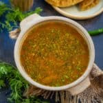 Katachi Amti is tangy and spicy Maharashtrian dal prepared with chana dal (Bengal gram), dry coconut, tamarind pulp, jaggery, and a few spices. This thin tempered dal is popularly served with puran poli (vegan).