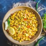 Corn Chaat is a mix of boiled corn kernels which is tossed with chutneys, veggies and a tad of spices which renders it a superb flavour. You can also call it sweet corn chaat masala if you wish to :) Here is how to make corn chaat at home in 2 different ways.
