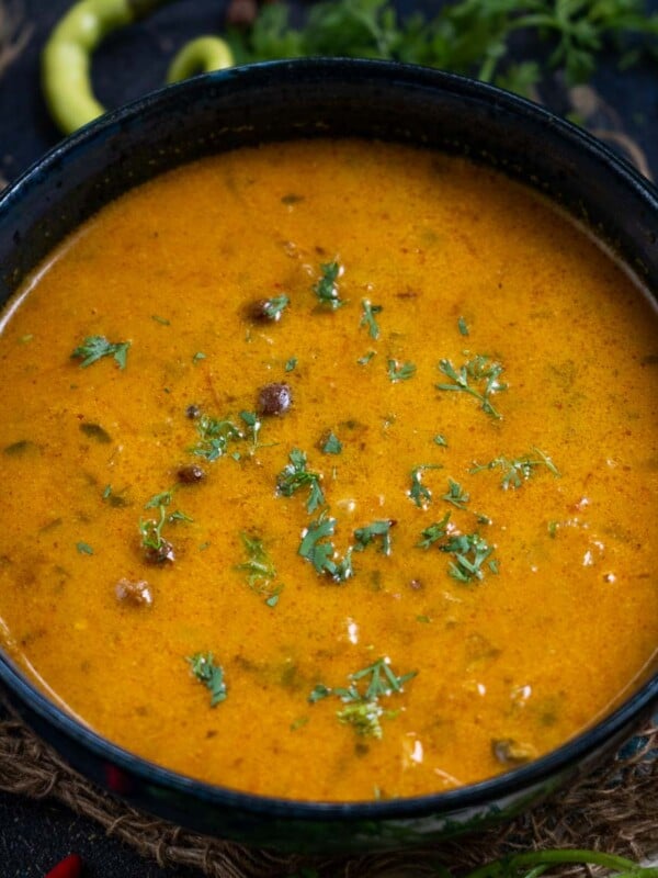 Jaisalmeri Chana is a traditional Rajasthani recipe from the Jaisalmer region where black chickpeas are cooked in a yogurt-based curry. Here is how to make it.
