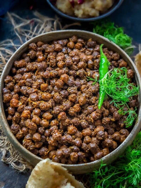 Sookha Kala Chana is a delicious and popular Ashtami dish for the Navratri Pooja. It is made from black chickpeas, tomatoes, spices, and without onions and garlic. Serve it with Poori and Sooji Halwa for Navmi Prashad.