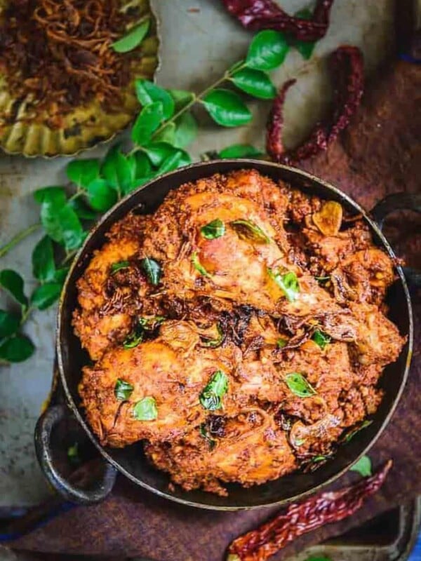 Mangalorean Chicken Sukka is a dry dish made using fresh chicken, masalas, grated fresh coconut and it is generously tempered using ghee as well as onions.