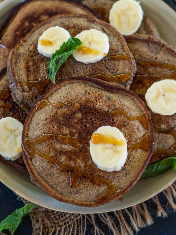 Ragi Banana Pancake (Finger Millet Banana Pancake) is a healthy breakfast option made using simple ingredients. Serve these with a drizzle of honey or maple syrup and your favorite pancake toppings.