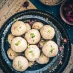 In this recipe of Til Mawa Ladoo, we use the distinctively nutty flavor of til blended with Mawa (Khoya) to create a perfect sweet.