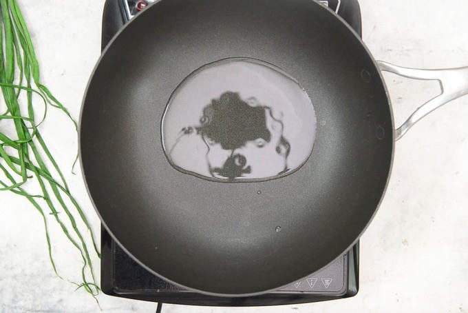Oil heating in a pan.