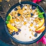 Peach Oat Smoothie Bowl or Peachy Oat Smoothie is a delicious Peach Smoothie Recipe which is a breeze to make and is quite filling to sail you till the lunch time.