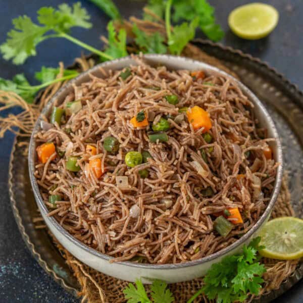 Ragi Vermicelli (Ragi Semiya) is a South Indian-style breakfast recipe made with finger millet semiya. Follow my easy recipe to make it.
