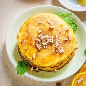 Step by Step and Video instructions to make Healthy Whole Wheat Orange Pancakes Recipe which is a wonderful choice for breakfast and is super easy to make.