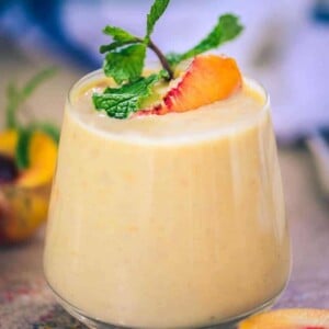 A sip of this delicious Healthy Peach Pie Smoothie is just the perfect concoction to make your day a whole lot better.