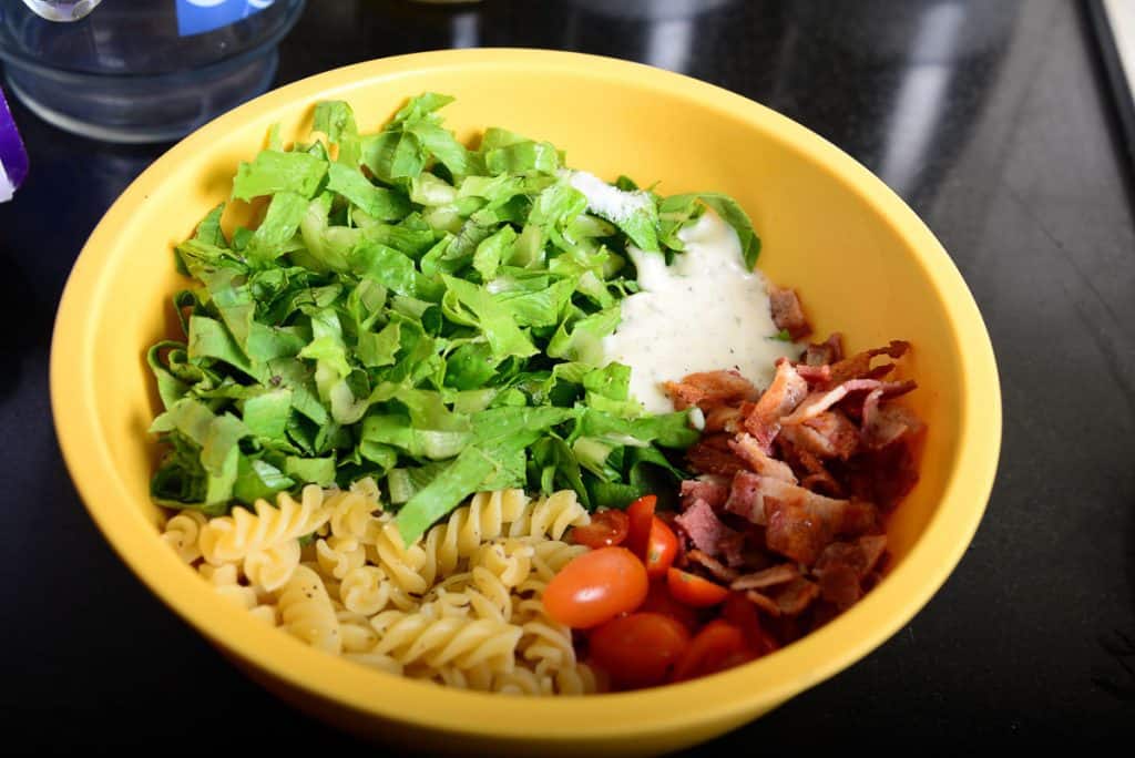 If you think that the classic BLT is the most delicious and easy to make sandwich, you must give this Ranch BLT Pasta Salad Recipe a try. It's easy to make and very delicious. Here is a step by step recipe to make it.