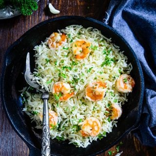 Garlic Butter Shrimp Rice is a one-pot easy recipe which is perfect to make for weekday dinner. It's delicious, filling & quick to make. Here is a simple recipe to make it.