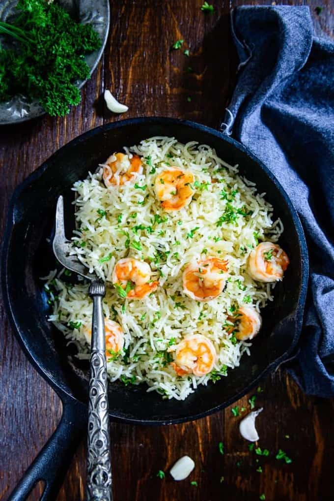 Garlic Butter Shrimp Rice is a one-pot easy recipe which is perfect to make for weekday dinner. It's delicious, filling & quick to make. Here is a simple recipe to make it.