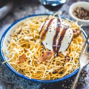 Looking for a different and unique dessert to make? These Crispy Sesame Honey Noodles Recipe or Darsaan as called in the local language are a delicious option for you. Serve them with a big scoop of vanilla ice cream and see your guests wipe off the plates. Here is how to make it.
