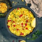 Indori Poha is a style of making Poha or flattened rice like how it's made in Indore. Here is How to make Indori Poha.