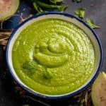 Guava Chutney (Amrood Ki Chutney) is a delicious Indian accompaniment made using fresh guava, cilantro, and a few other ingredients. Serve it with any Indian meal.