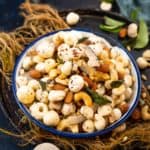 Roasted Makhana Chivda (Makhana Namkeen) is a healthy and delicious snack that can be served at tea time or can be munched throughout the day. It is low-fat, healthy, and gluten-free and can be served for vrat (Hindu fasting days) as well. Sharing the recipe to make it in a pan over the stovetop and also in an air fryer.