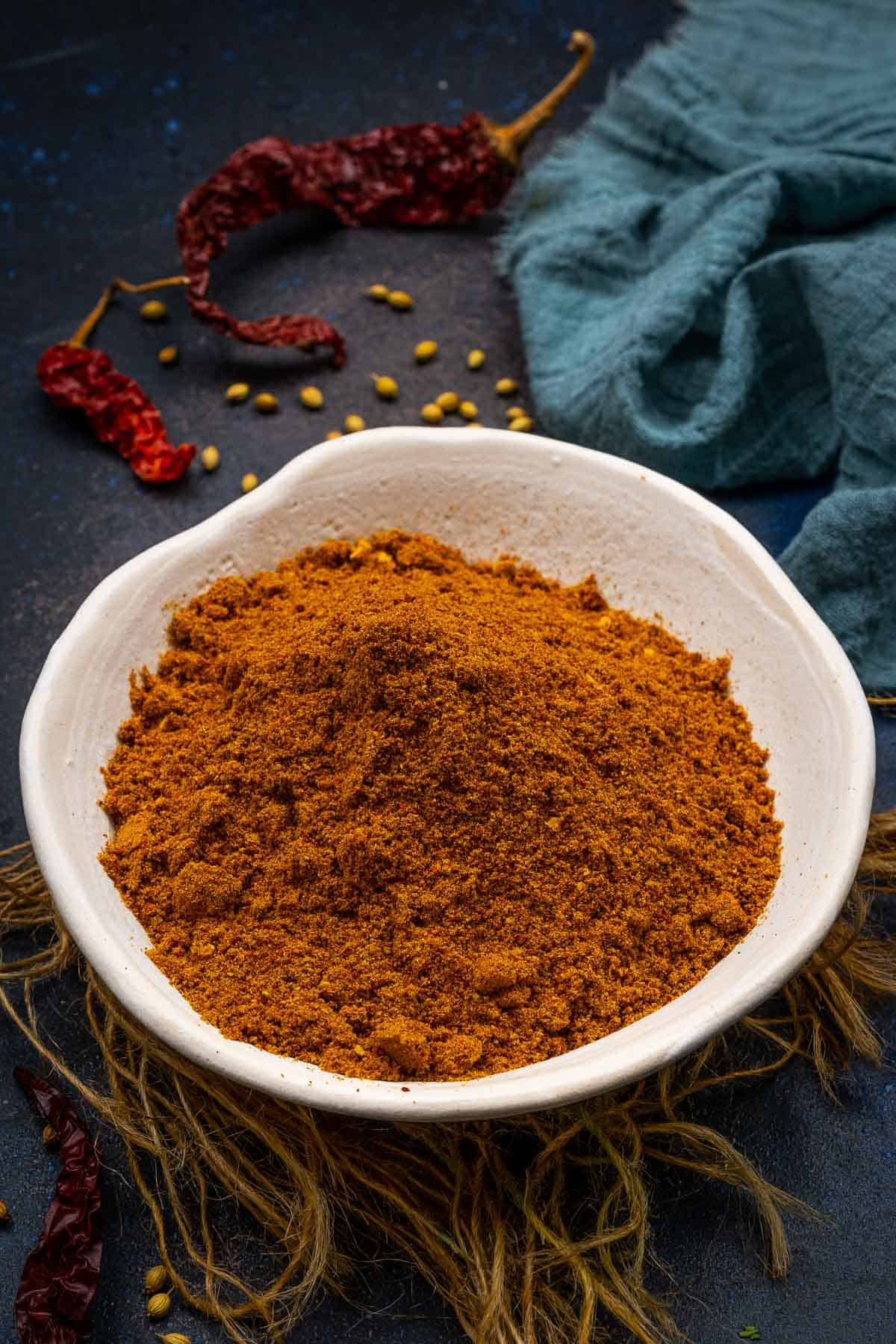 Achari masala powder served in a bowl.