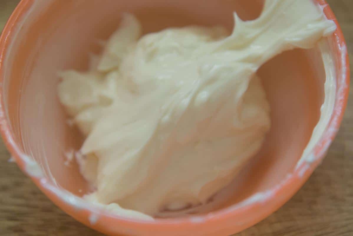 Mixed cream cheese and sugar in a bowl