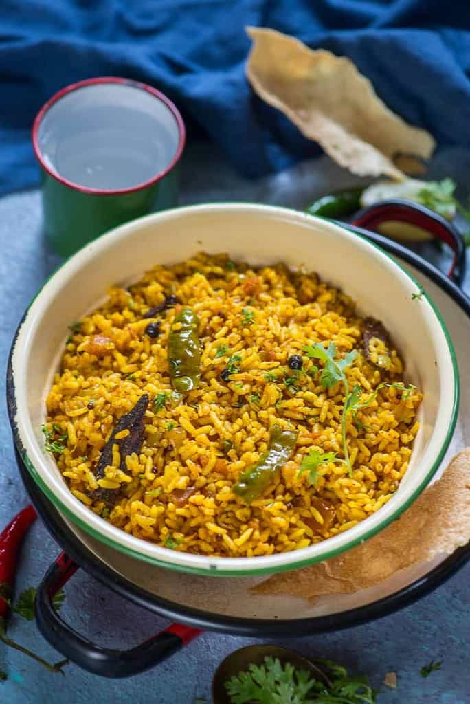 Tomato Rice is a delicious South Indian style rice recipe which is super quick to make. make it for breakfast, lunch or dinner, it fits it all.