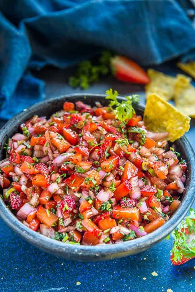 Best balsamic Strawberry Salsa served ina serving bowl along with nachos