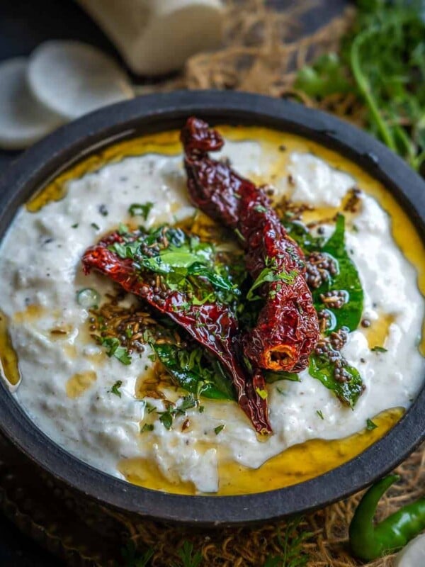 Mooli Raita (Radish Raita) is a crunchy yogurt-based accompaniment that goes very well with any Indian meal. Make it using simple ingredients in just 10 minutes.