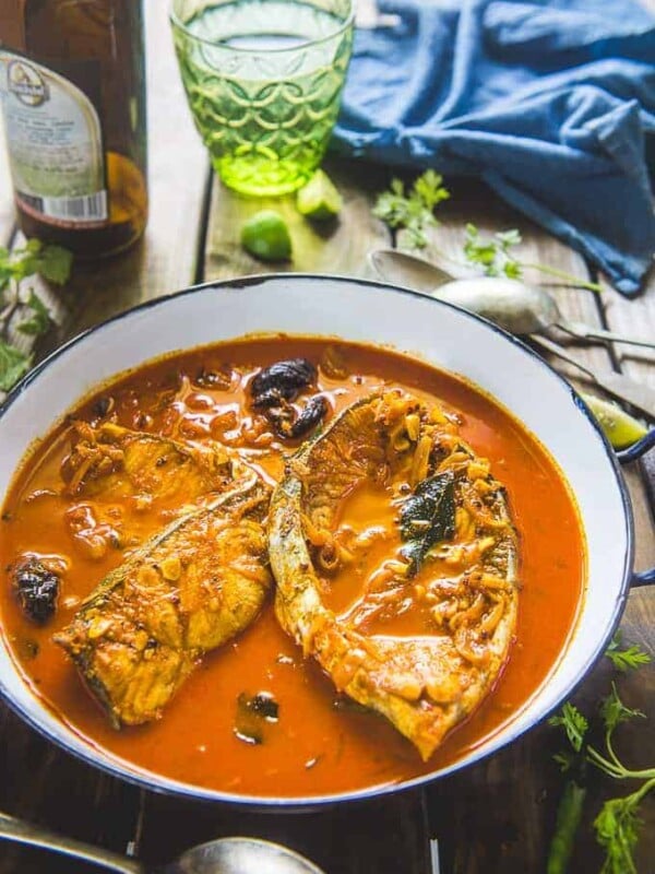 Kerala Fish Curry served in a serving bowl.